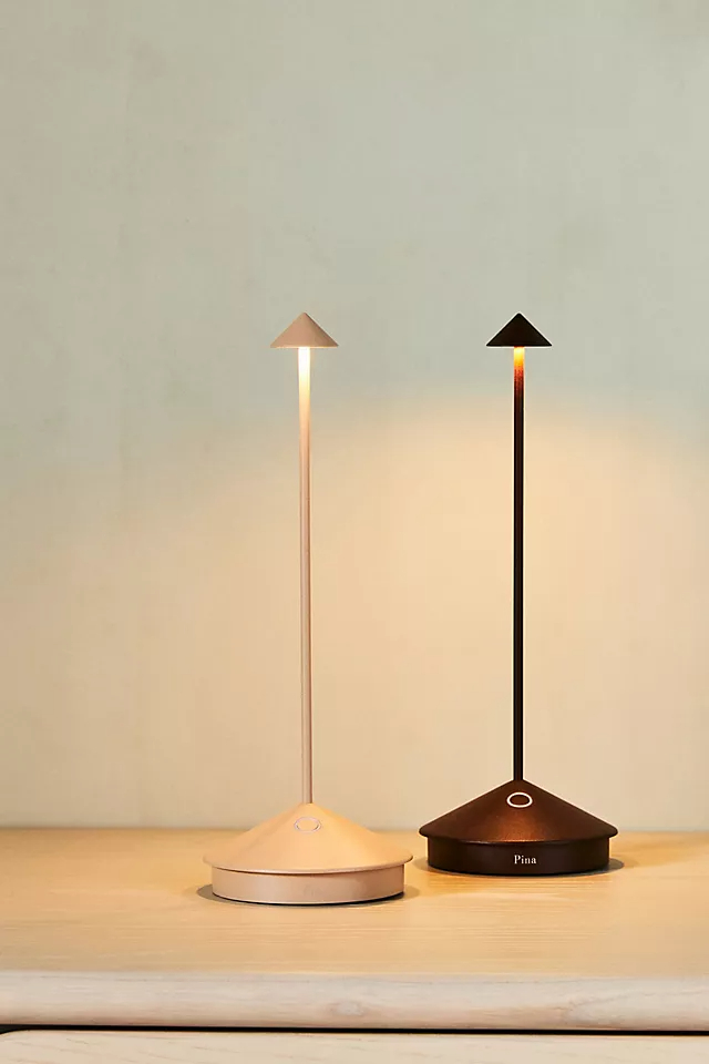 Pina table lamp, the right lighting can transform a room, adding warmth, ambiance, and style to any space. When it comes to selecting a table lamp