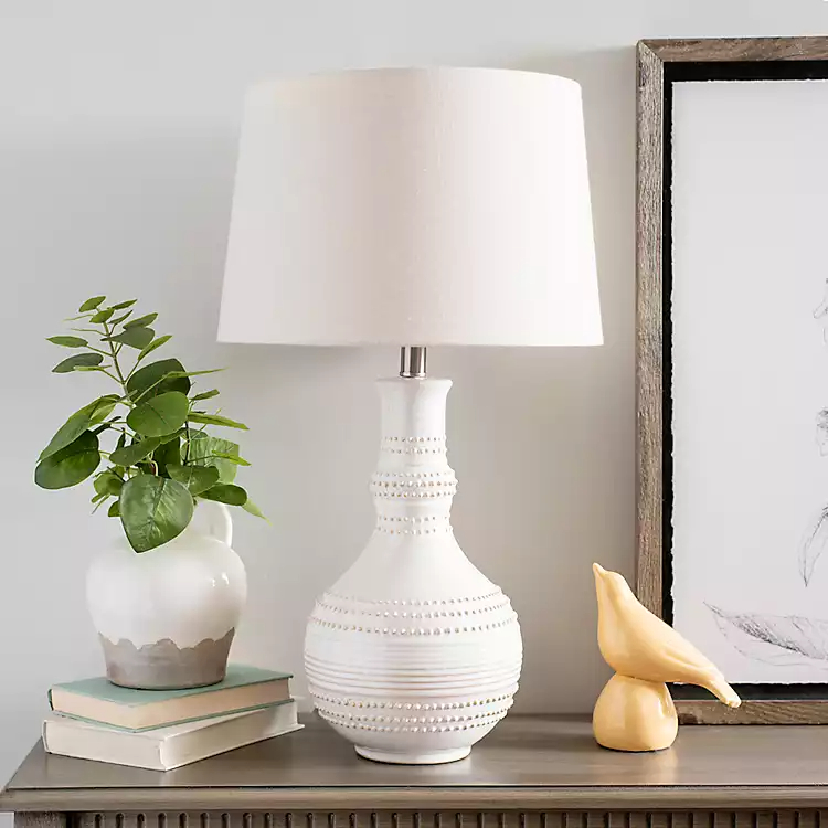 White ceramic table lamp can be a versatile and elegant addition to any room. With its timeless appeal and ability to complement a variety