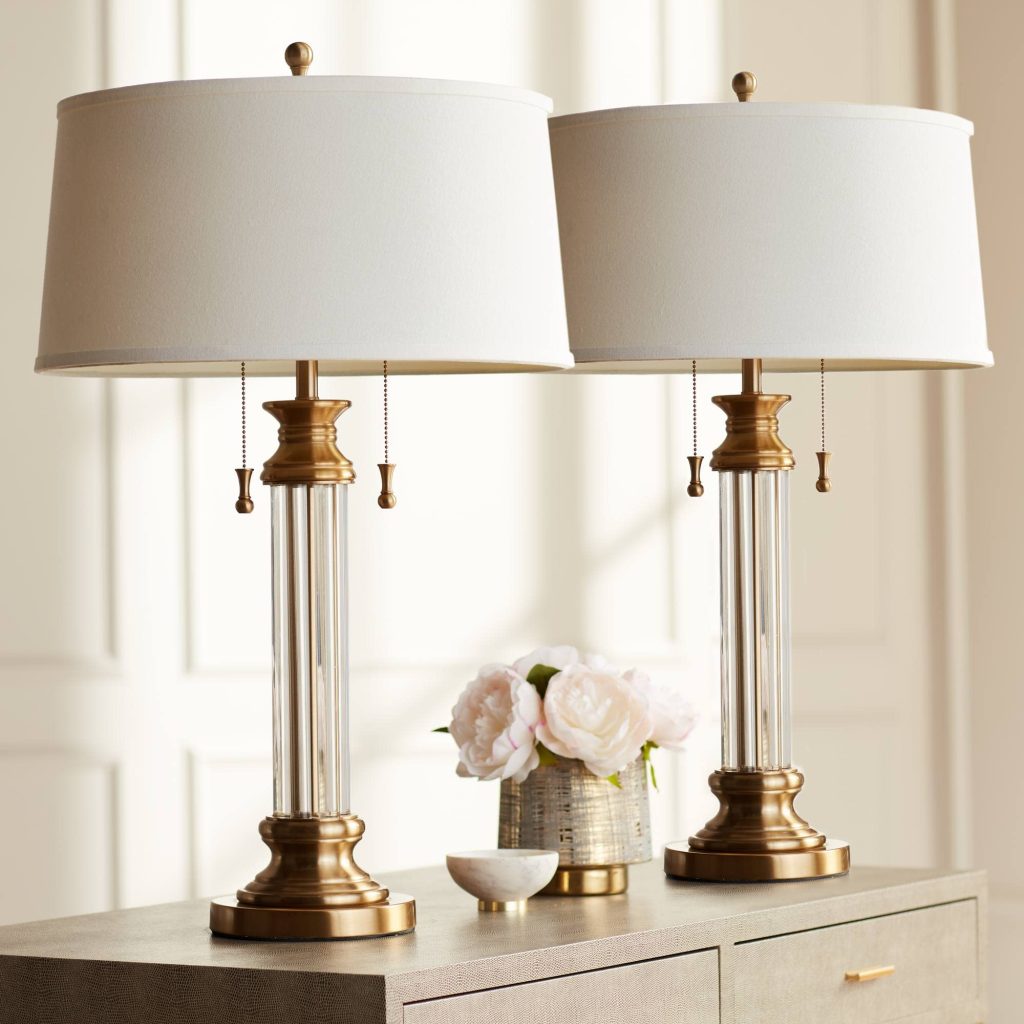 White and gold table lamp is a stylish and versatile accessory that can elevate the look and ambiance of any room. The combination of white