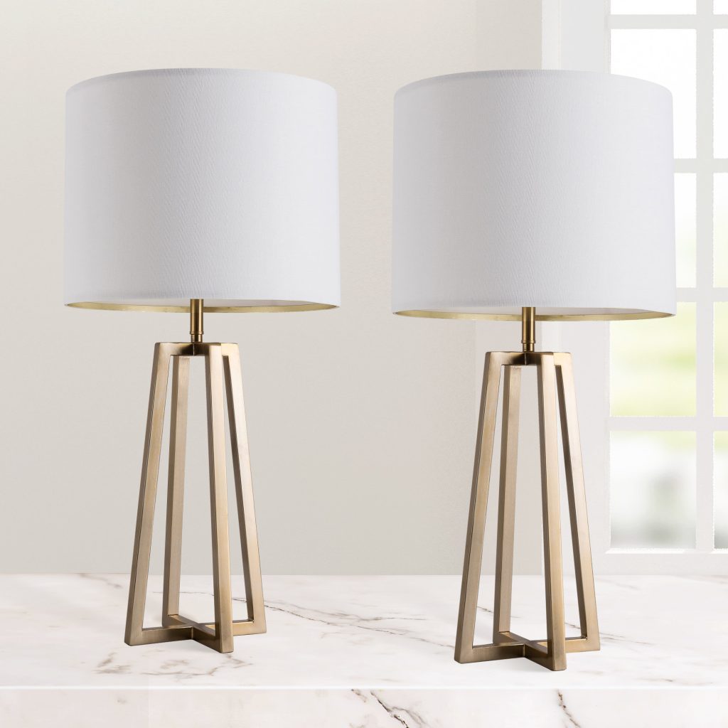 White and gold table lamp is a stylish and versatile accessory that can elevate the look and ambiance of any room. The combination of white